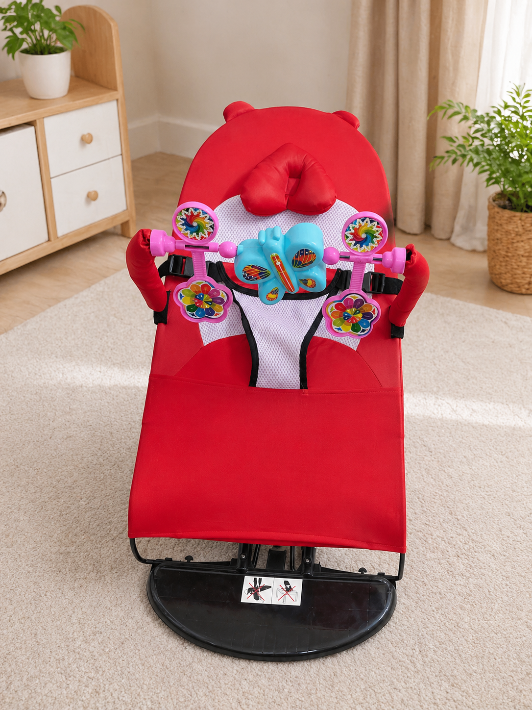 Red musical baby bouncer for kids playtime